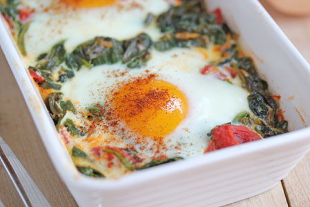 Baked Eggs with Spinach, Tomatoes, and Garlic | 5DollarDinners.com